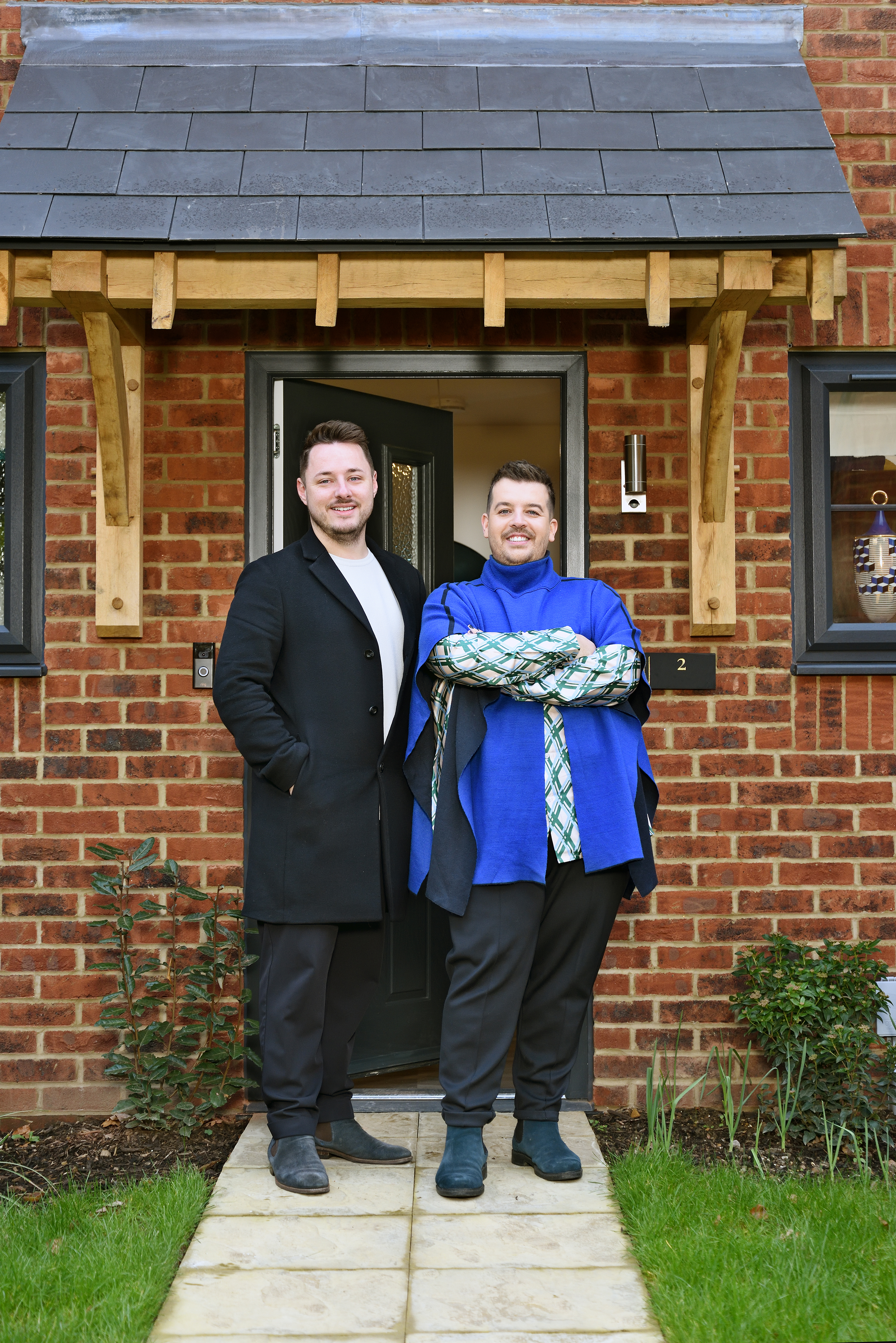 First time buyers Nick and Adam outside their new home
