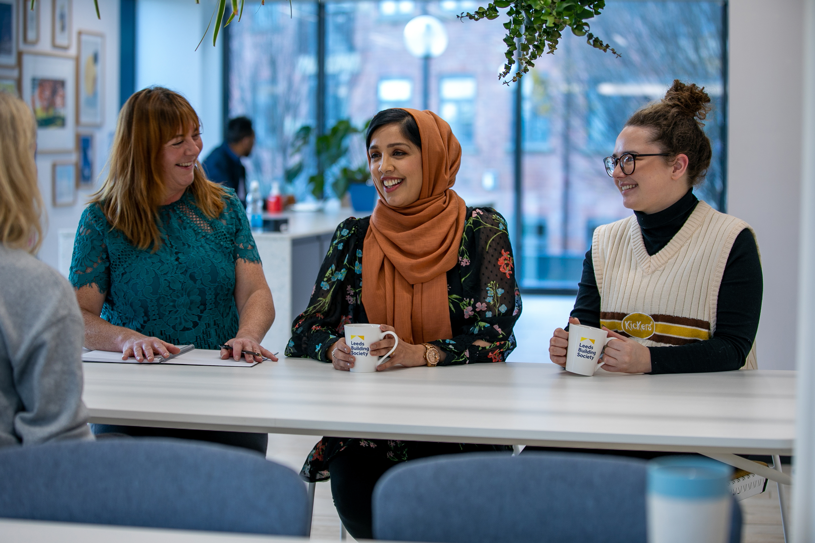 Three women in conversation