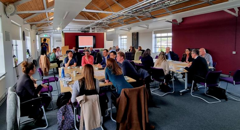 Image of attendees taking part in the event workshop 