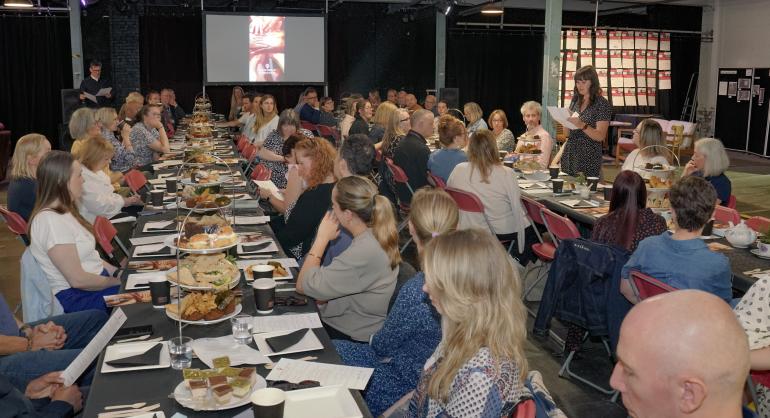 Delegates at the community anchor event