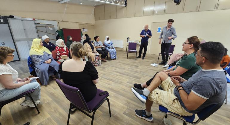 A group of people taking part in a community listening exercise focus group at New Wortley Community Centre