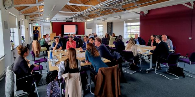 Image of attendees taking part in the event workshop 