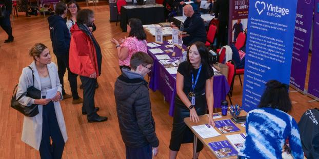 Exhibitors engaging with jobseekers at the Morley Town Deal Jobs Fair