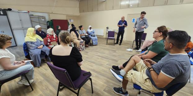 A group of people taking part in a community listening exercise focus group at New Wortley Community Centre
