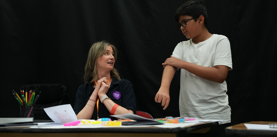 Staff engaging with young person