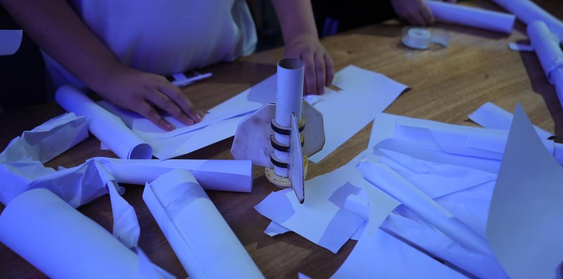 Participants creating rocket models